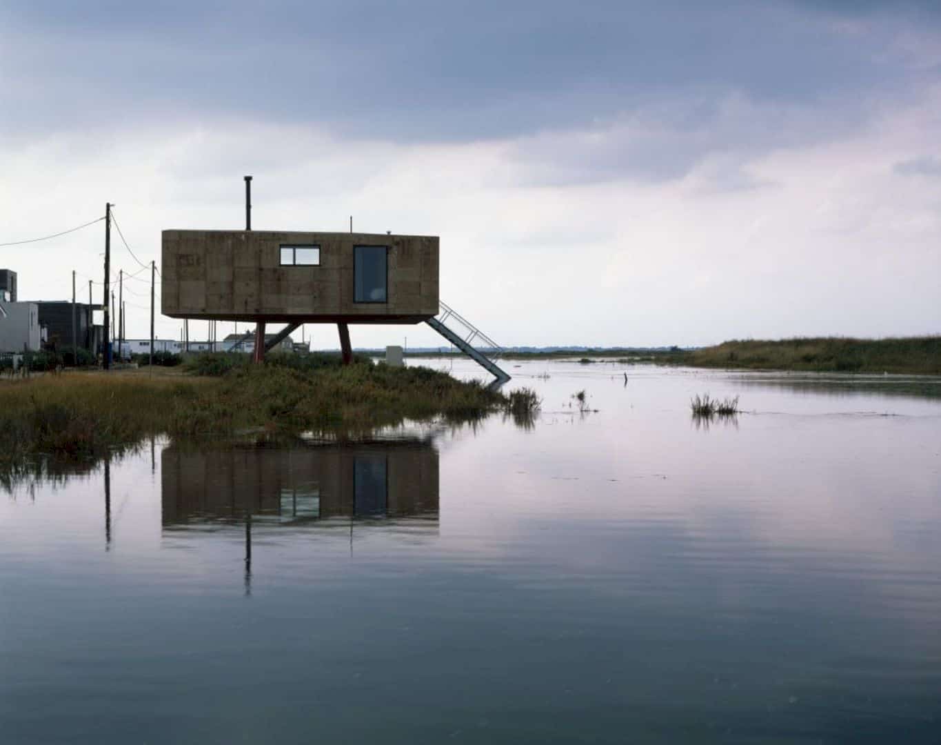 A Cork Clad Cabin Above A Tidal Salt Marsh 5
