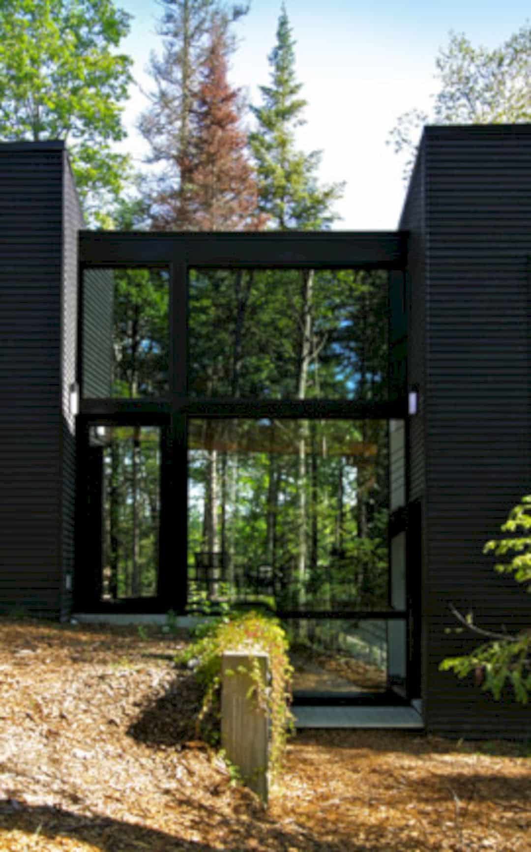 Geometry In Black A Three Block Black Building In Quebecs Dense Forest 12