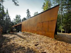 Geometry In Black A Three Block Black Building In Quebecs Dense Forest 7