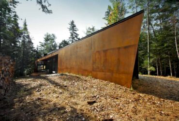 Geometry In Black A Three Block Black Building In Quebecs Dense Forest 7