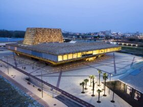 La Llotja Theatre And Conference Centre Monolithic Volume Emerges From The Spanish Earth 11