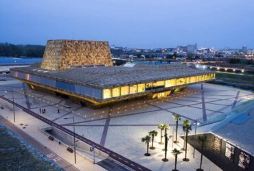 La Llotja Theatre And Conference Centre Monolithic Volume Emerges From The Spanish Earth 11