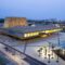 La Llotja Theatre And Conference Centre Monolithic Volume Emerges From The Spanish Earth 11