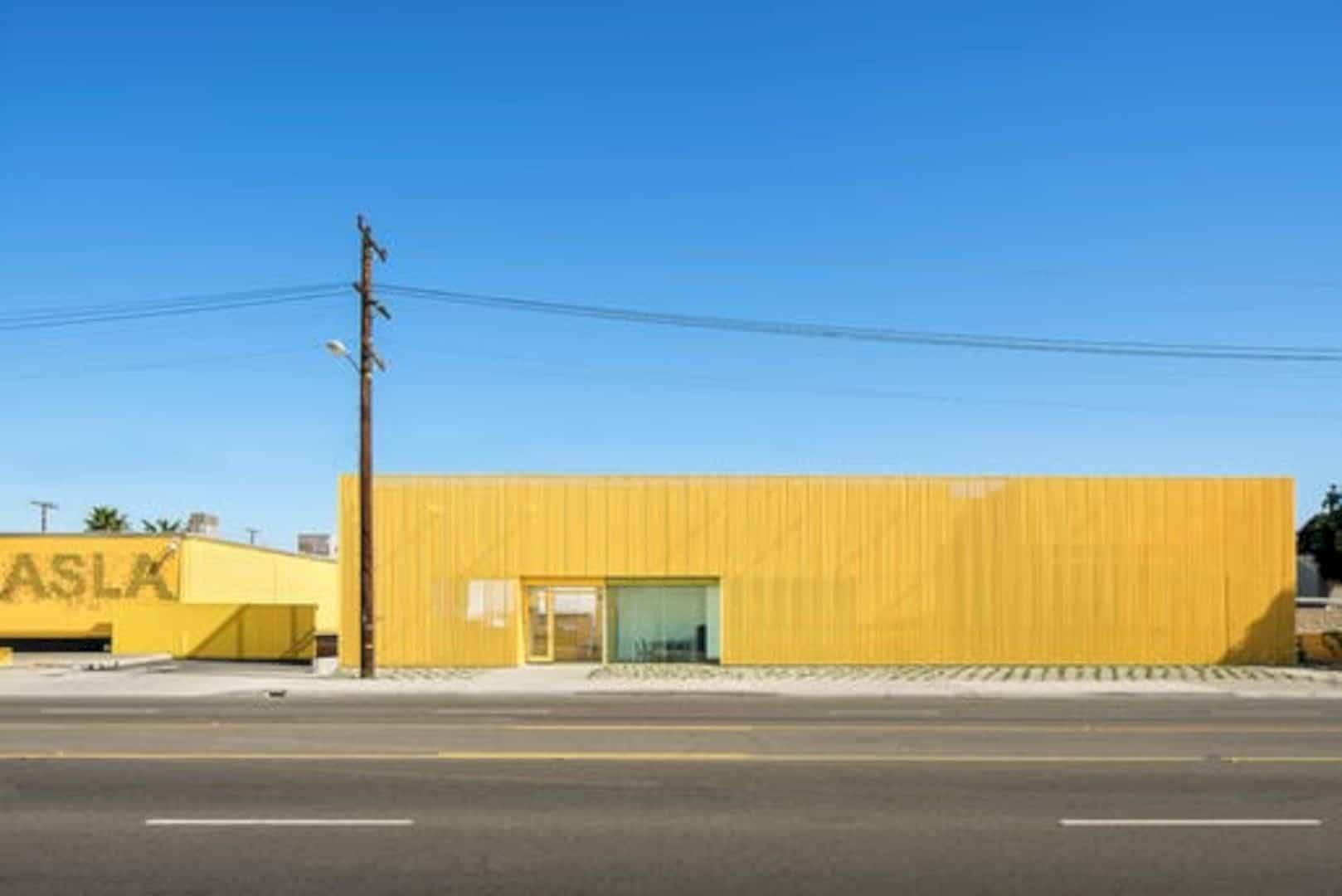 Animo South Los Angeles High School A Bright Yellow Campus Building In Sunny La Atmosphere 11