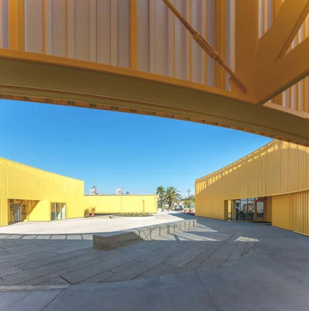 Animo South Los Angeles High School A Bright Yellow Campus Building In Sunny La Atmosphere 5