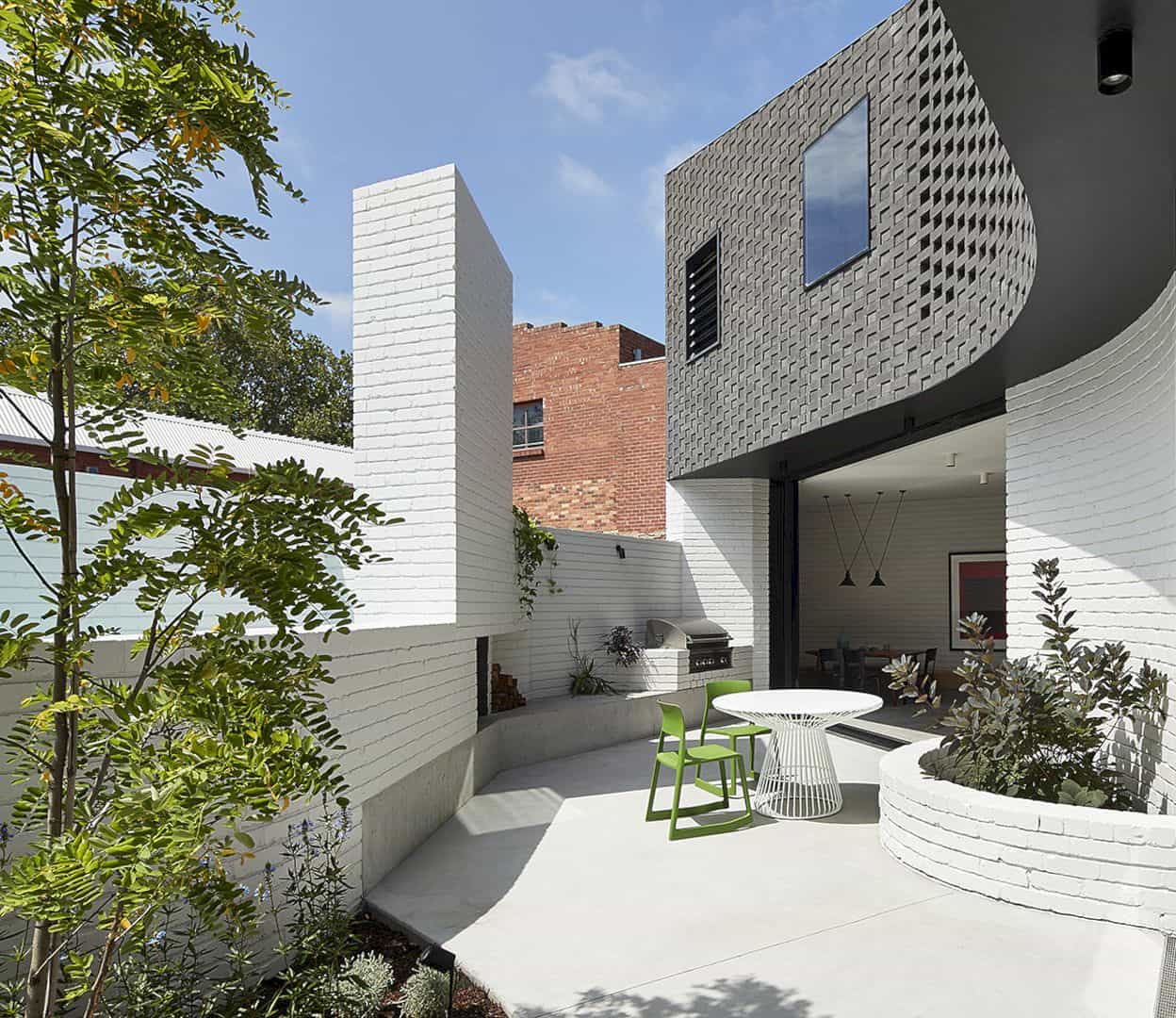 Perimeter House A Secluded House That Displays A Vibrant Industrial Context 11