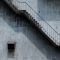 Brown Metal Staircase And Gray Painted Wall 1246078