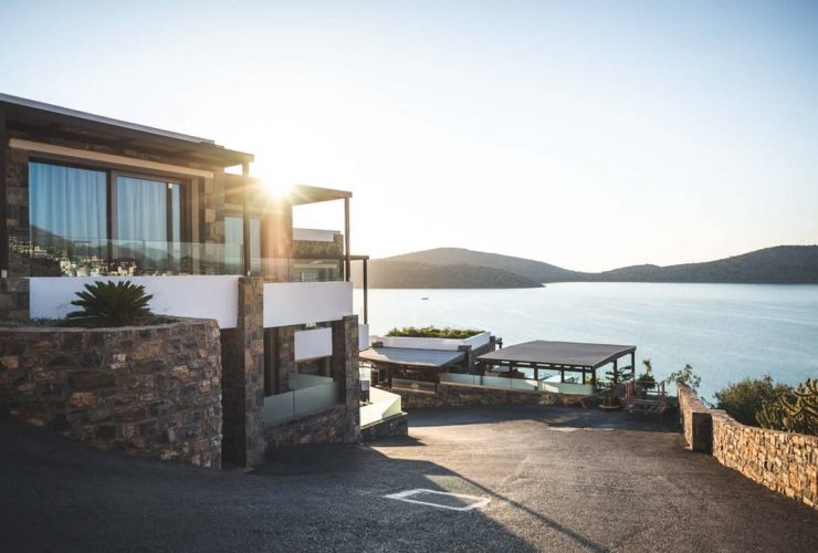 Sun Piercing Of Brown Concrete House Near Sea 1732414
