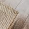 Laminate parquete floor with beige soft carpet