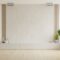 Cabinet for TV on the white plaster wall.
