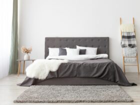 Cozy bedroom in scandinavian minimalist style, panorama