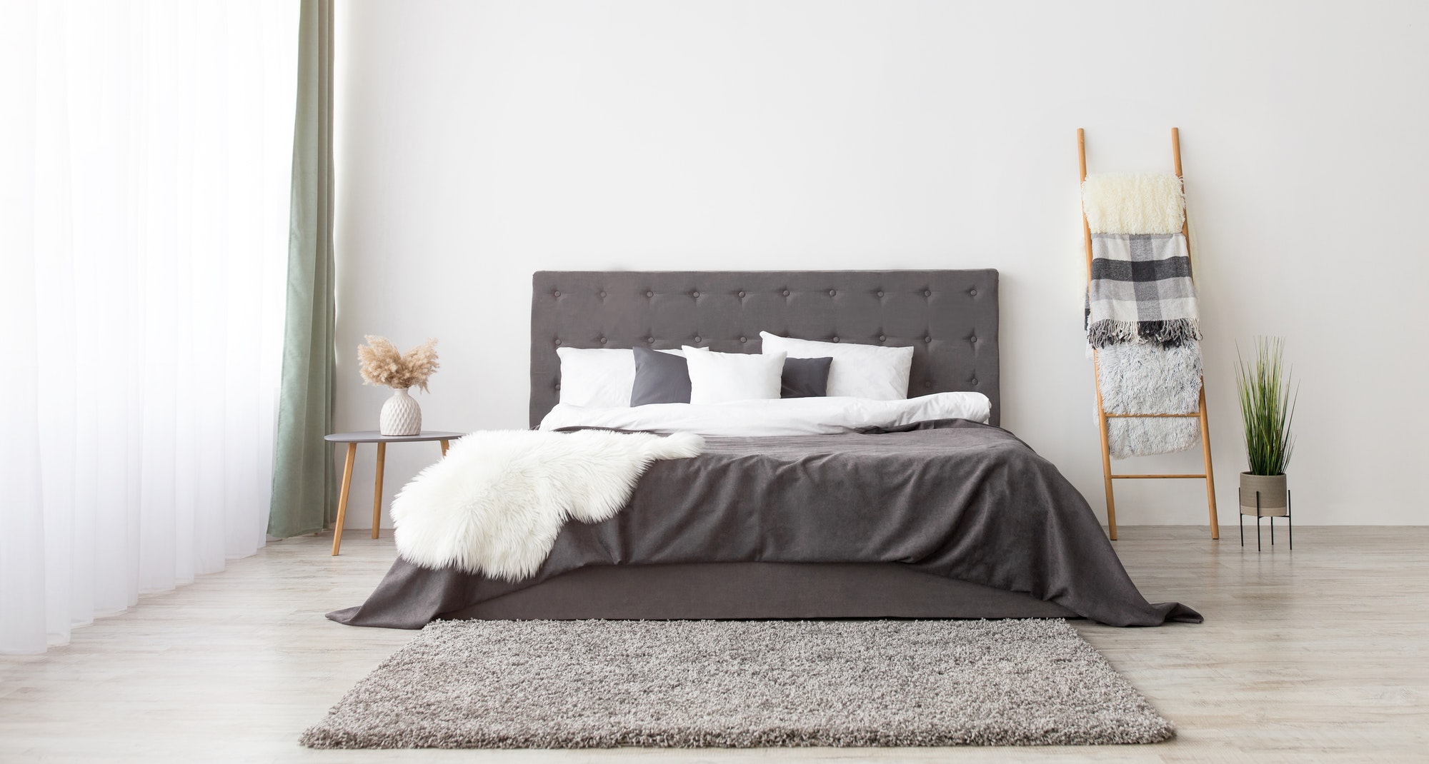 Cozy bedroom in scandinavian minimalist style, panorama