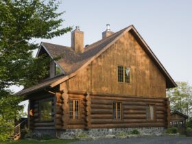 Exterior of cottage style log house with cedar shingles
