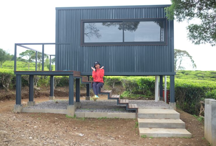 Happy People In Front Of Small House 2022 02 10 07 42 38 Utc