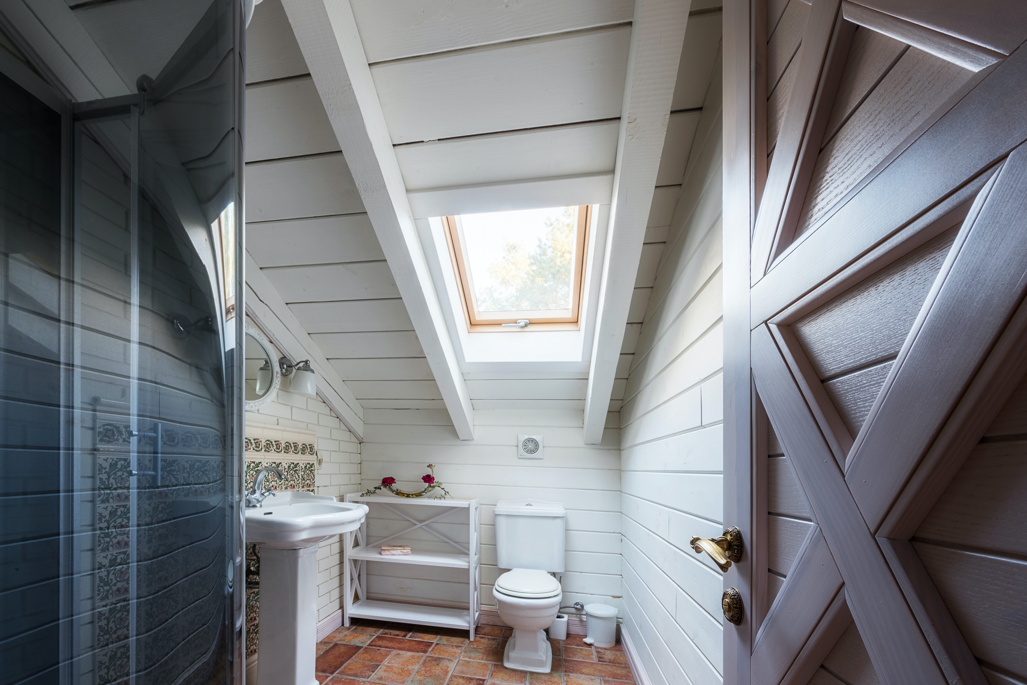 interior of bathroom in modern cottage house
