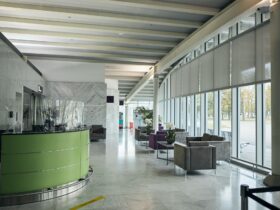 Foyer with floor-to-ceiling windows and modern furniture