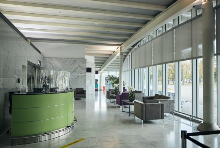 Foyer with floor-to-ceiling windows and modern furniture