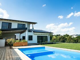 House with swimming pool outdoors in backyard garden