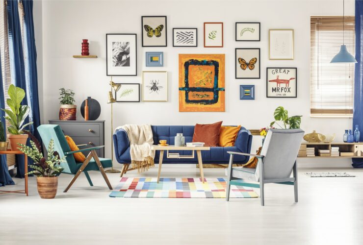 Simple posters gallery hanging on the wall in bright living room