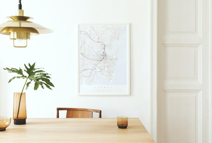 Stylish and eclectic dining room interior with mock up poster map.
