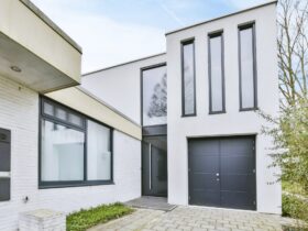 The entrance part of the house is in a minimalist style