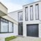The entrance part of the house is in a minimalist style
