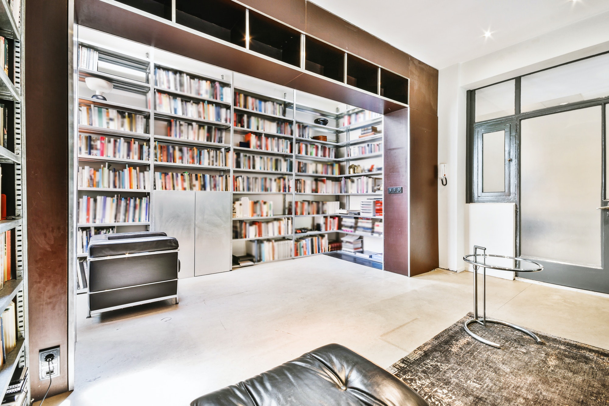 Home library interior in modern apartment