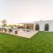 Modern house with garden swimming pool and wooden deck