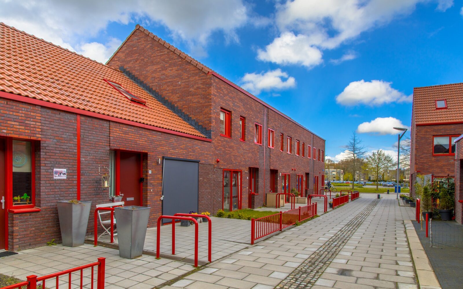 Modern street with red brick houses