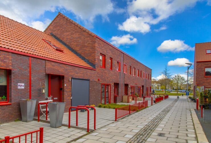 Modern street with red brick houses