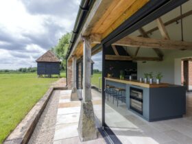 Open-air kitchen and backyard in modern home