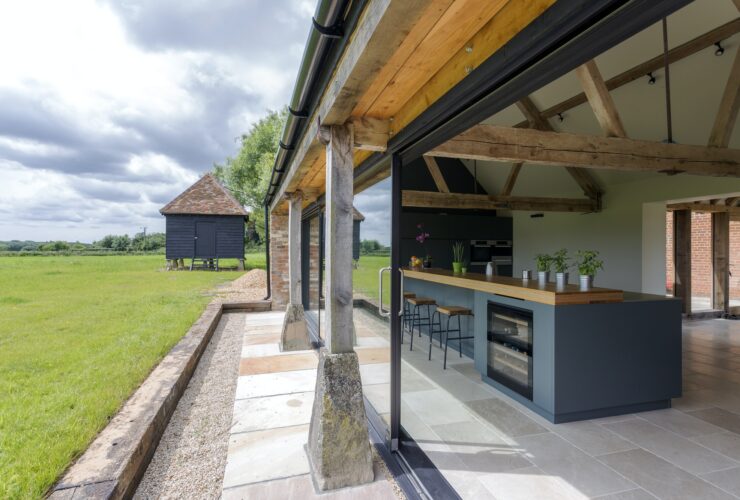 Open-air kitchen and backyard in modern home