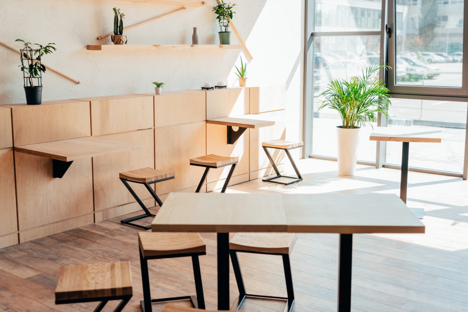 stylish interior of modern cafe with stylish wooden furniture