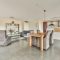 The interior of a spacious living room in an open design