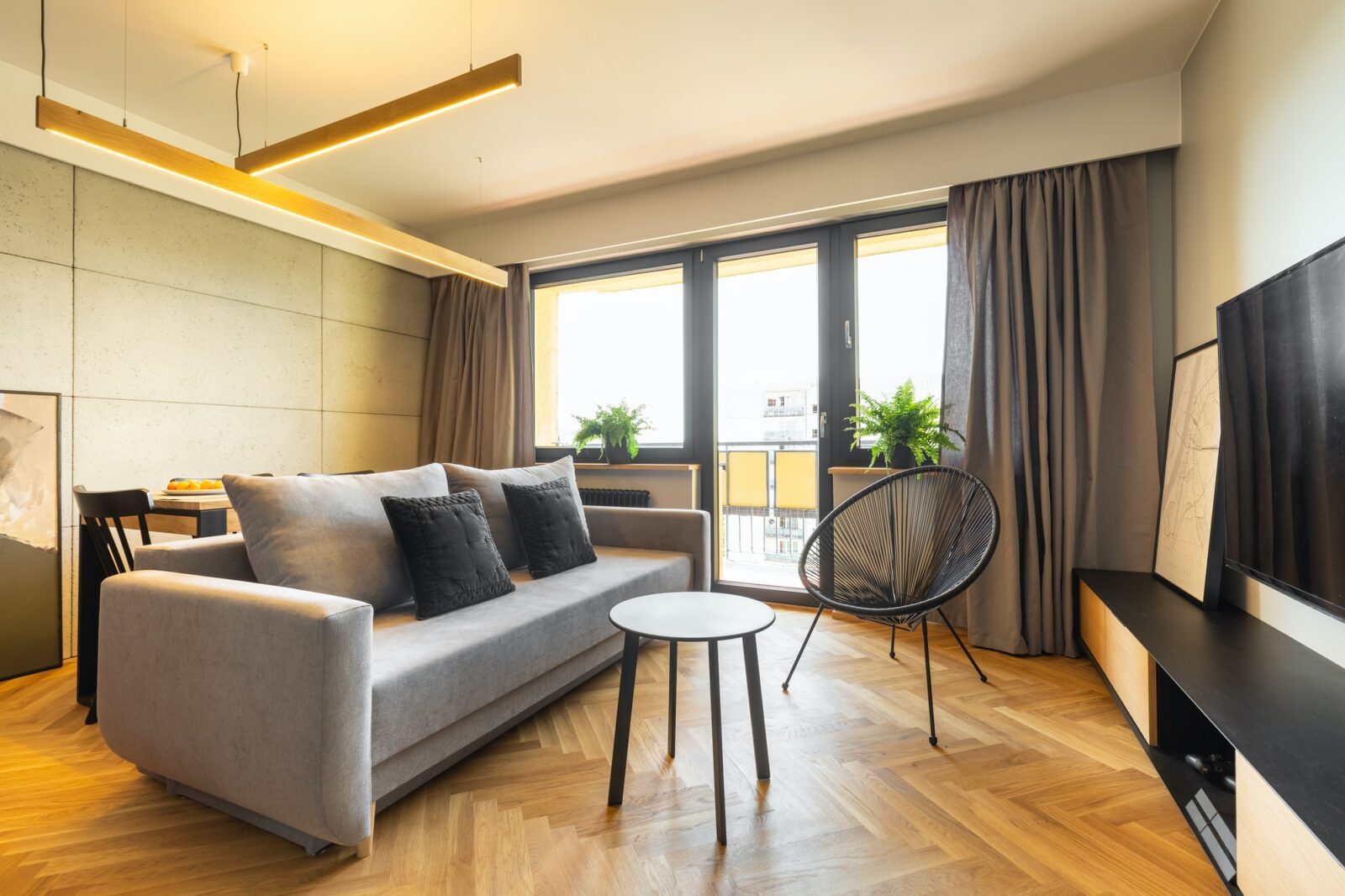 Urban style, cozy living room interior with industrial concrete