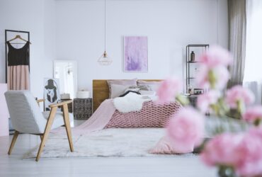 Flowers in chic pink bedroom
