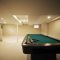 Interior Of Basement With Pool Table