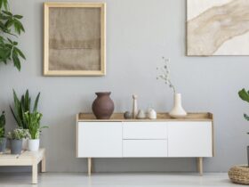 Real photo of a botanic living room interior with burlap artwork
