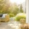 Beautiful summer day in elegant home garden with trendy furniture
