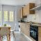 Kitchen interior with furniture and appliances