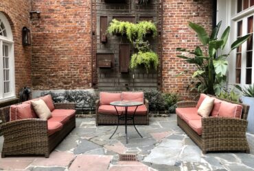 Outdoor living space in back garden patio