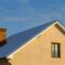 Roof of a new built house with nice window and chimney