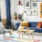 Bright and cozy living room interior with blue drapes, a sofa wi