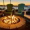 Fire pit by the bay at sunset