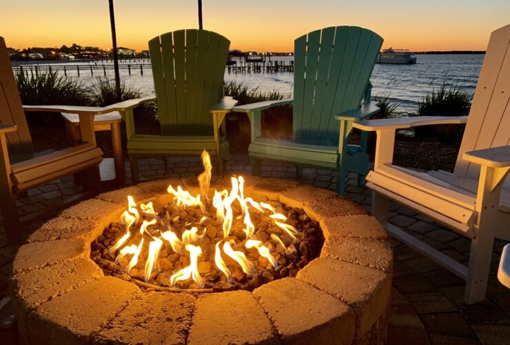 Fire pit by the bay at sunset
