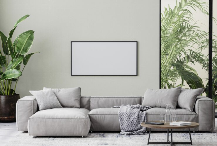 horizontal picture frame in living room interior mock up in gray tones with tropical palm