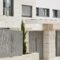 Modern residential building entrance. Estate property. Marble stone. Construction. Horizontal