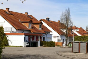 Classic german residential houses with orange roofing tiles and windows