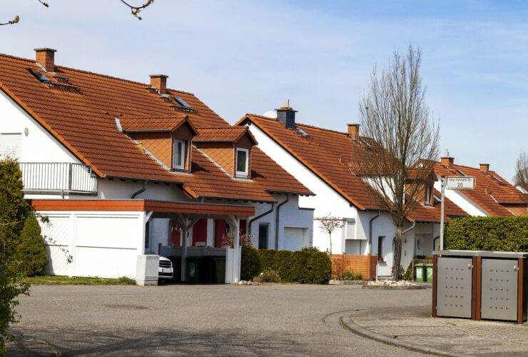 Classic german residential houses with orange roofing tiles and windows