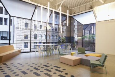 Modern windows and furniture in corporate business cafeteria